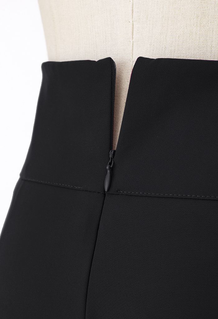 Pantalones de pierna ancha con cintura recortada en negro