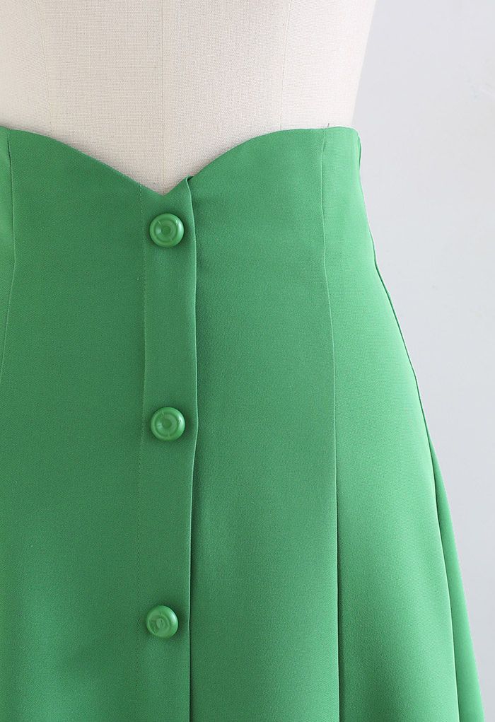 Falda midi acampanada de cintura alta con ribete de botones en verde