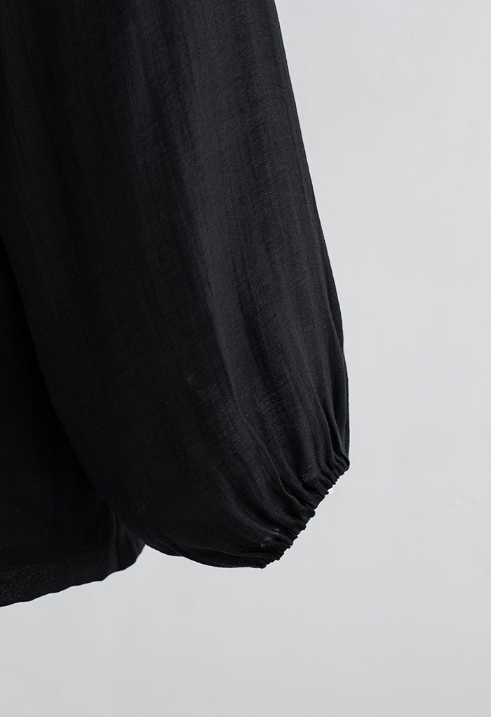 Conjunto negro de camisa con manga farol y pantalón corto acampanado Athleisure