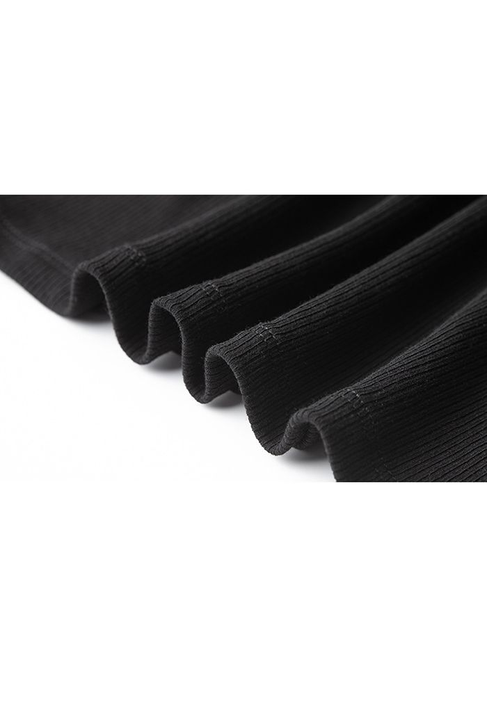 Camiseta sin mangas reversible con tira inclinada en negro