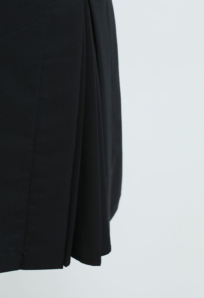Minifalda plisada empalmada en negro