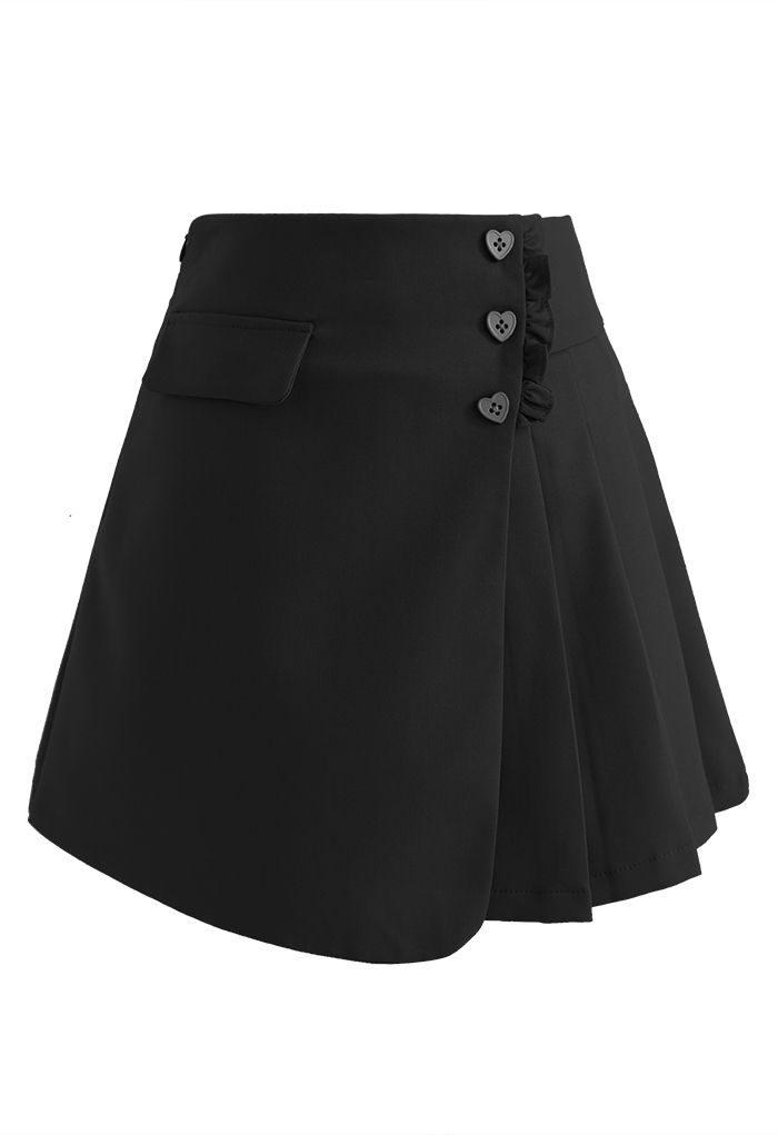 Minifalda plisada con botones en forma de corazón en negro