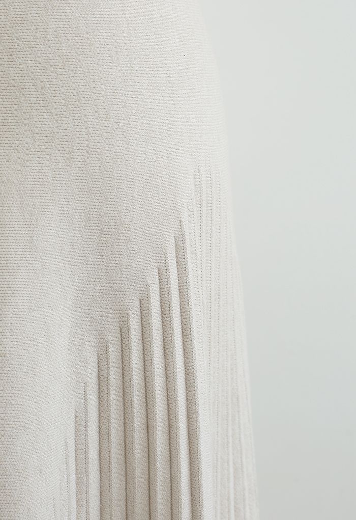 Falda midi de punto ultrasuave con textura plisada en color arena