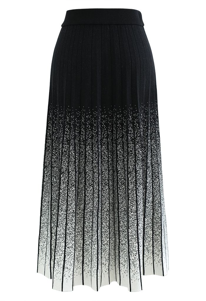 Falda de punto plisada con puntos densos en negro
