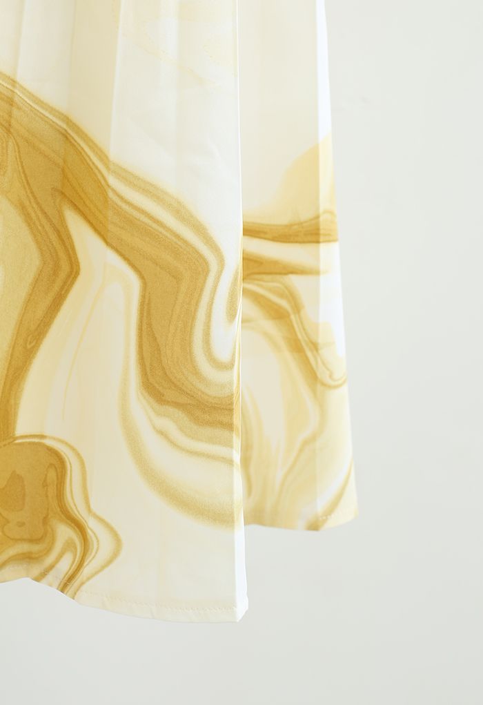 Falda midi plisada con estampado de remolinos de acuarela en amarillo