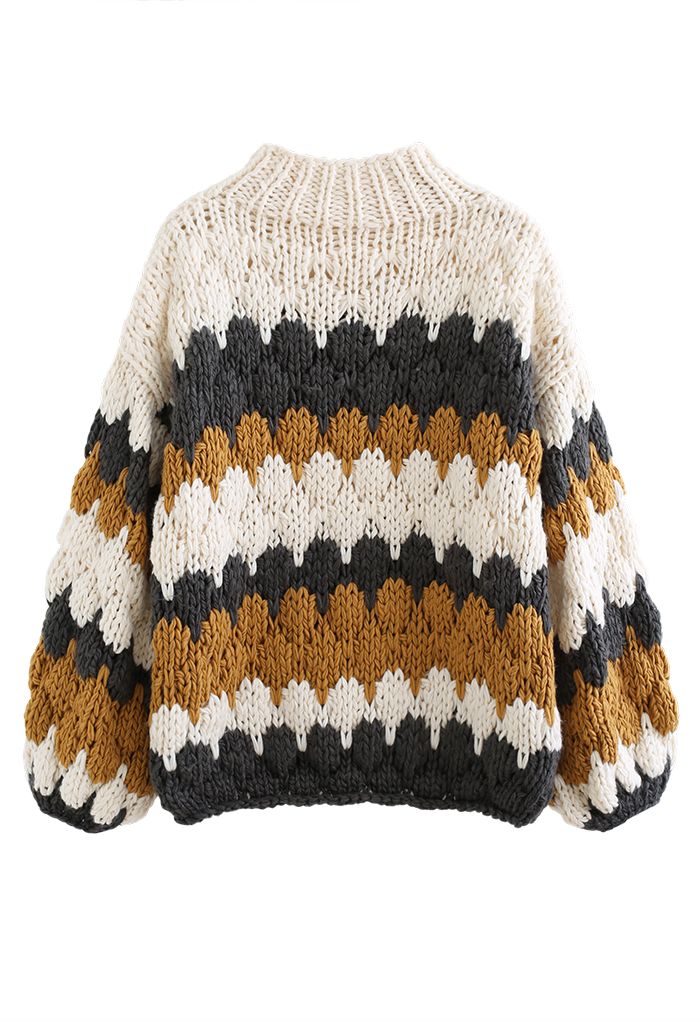 Suéter grueso tejido a mano con cuello alto con bloques de color en humo