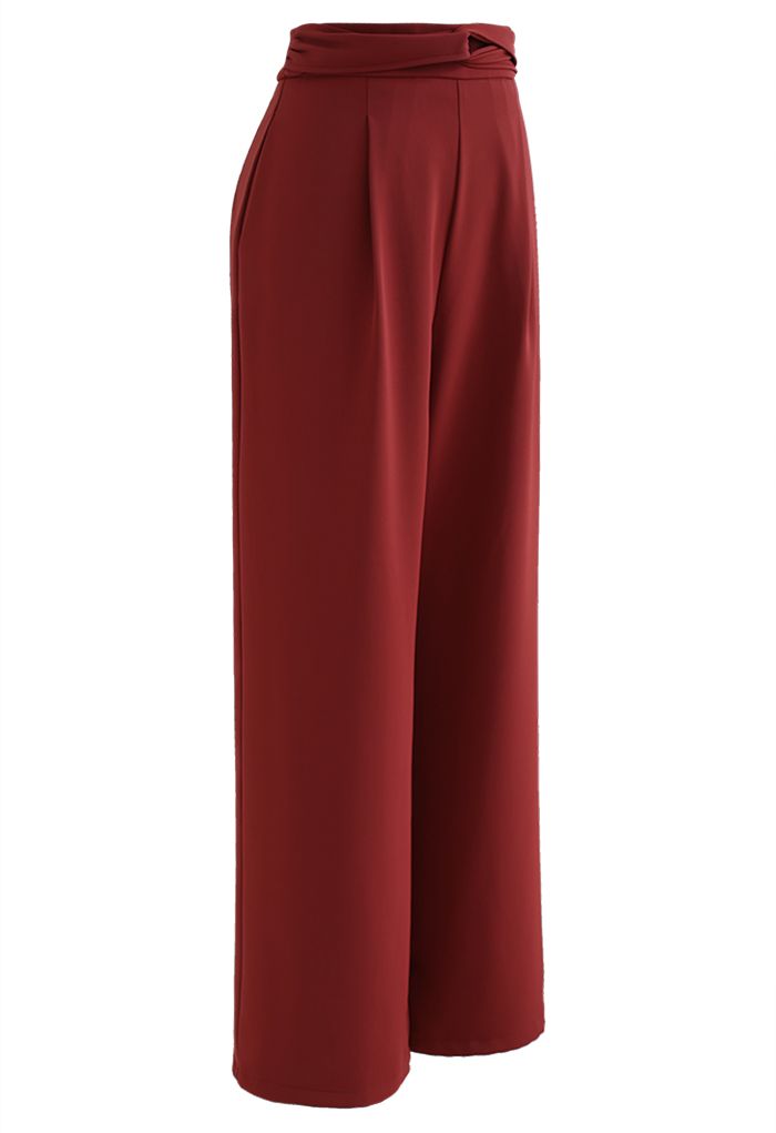 Pantalones cómodos drapeados con cinta entrecruzada en rojo óxido
