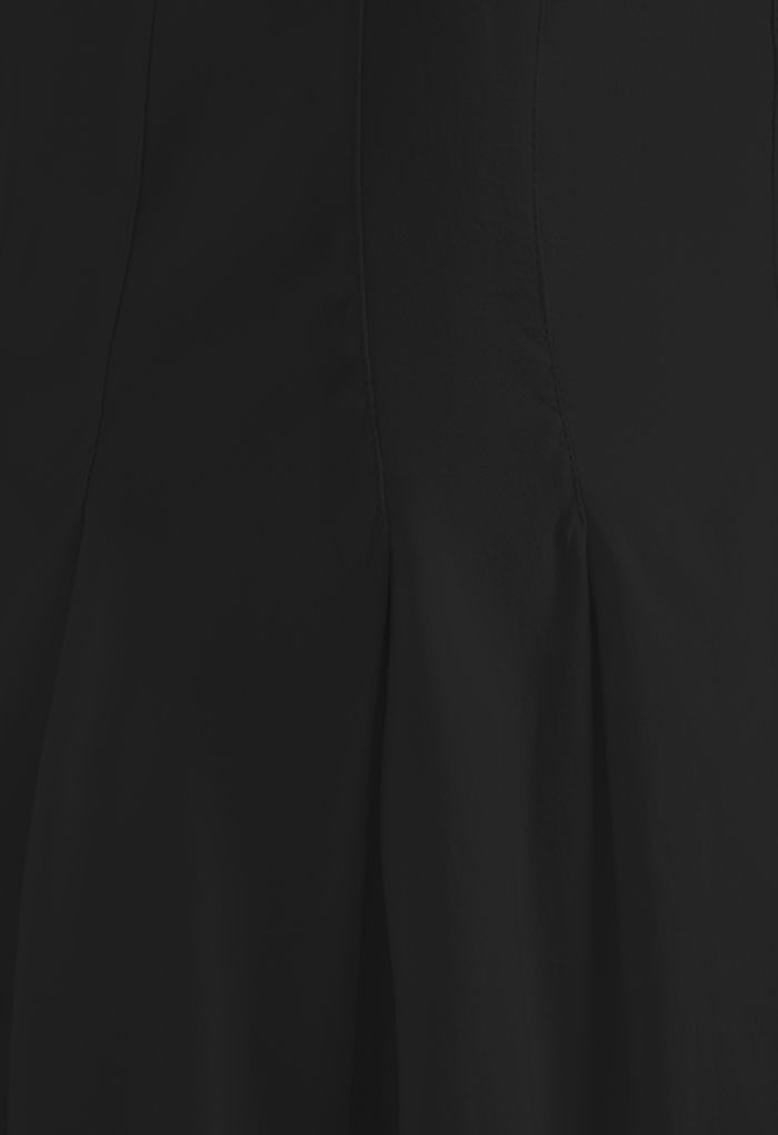 Vestido camisero con costuras entallado y acampanado en negro