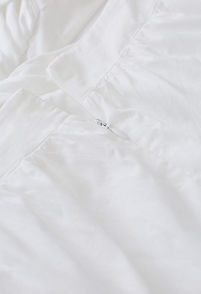 Minivestido con cintura recortada y manga de burbuja de crochet en blanco