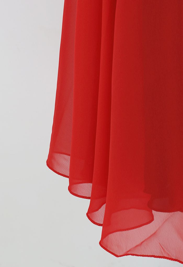 Falda larga cruzada empalmada con cintura anudada en rojo