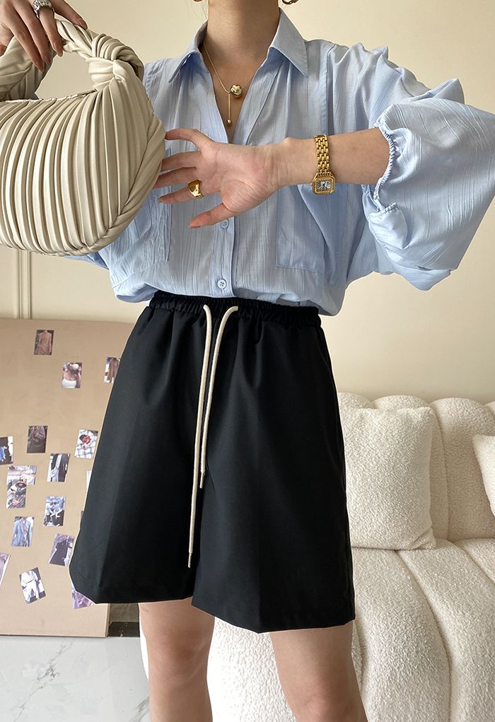 Shorts de pernera ancha con cordón en la cintura en negro