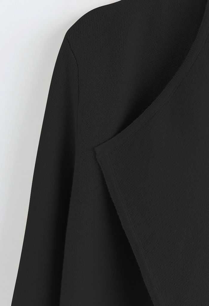 Elegante abrigo de punto con parte delantera abierta en negro