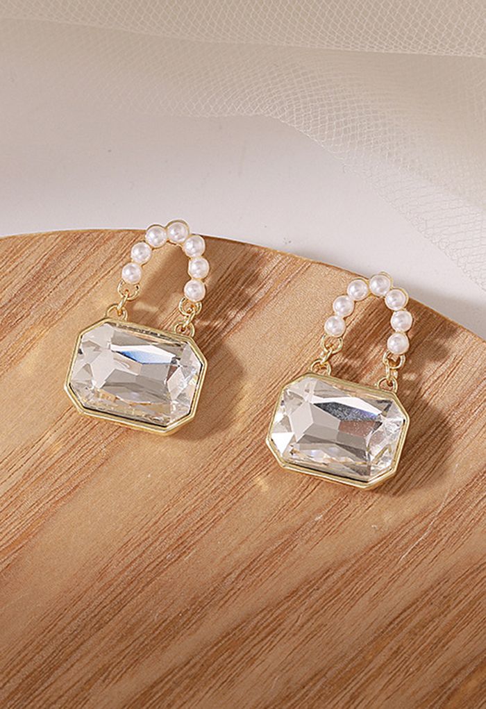 Aretes de perlas con candado de cristal