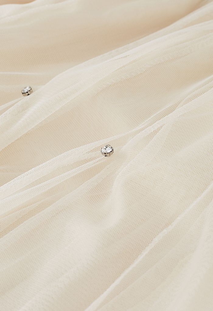 Falda de tul color crema adornada con cristales