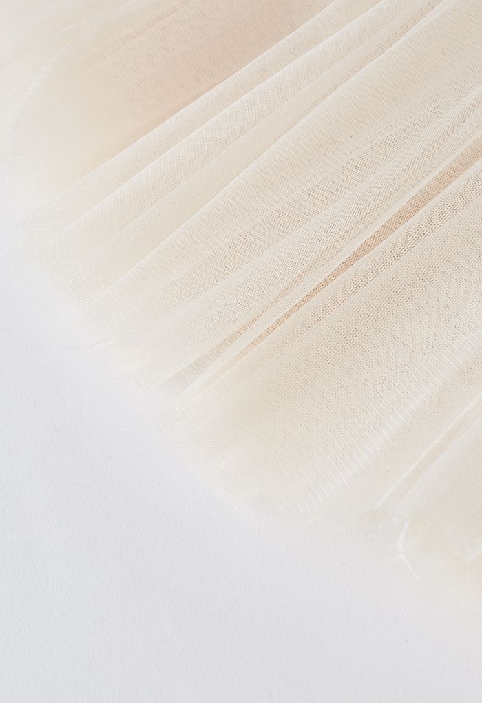 Falda de tul color crema adornada con cristales
