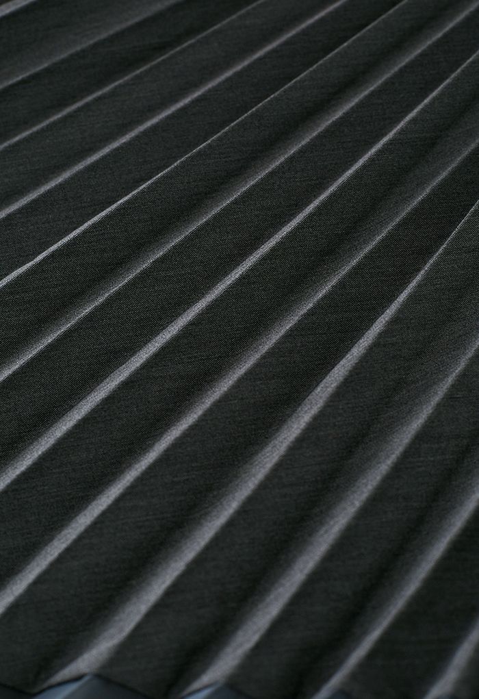 Falda midi plisada con paneles de organza asimétrica en humo
