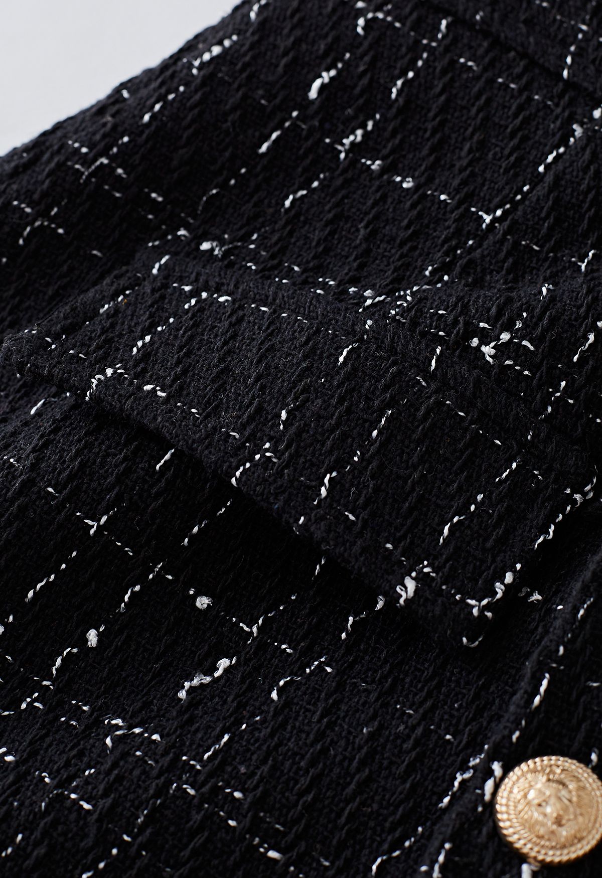 Falda pantalón con solapa abotonada de tweed de cuadrícula en negro