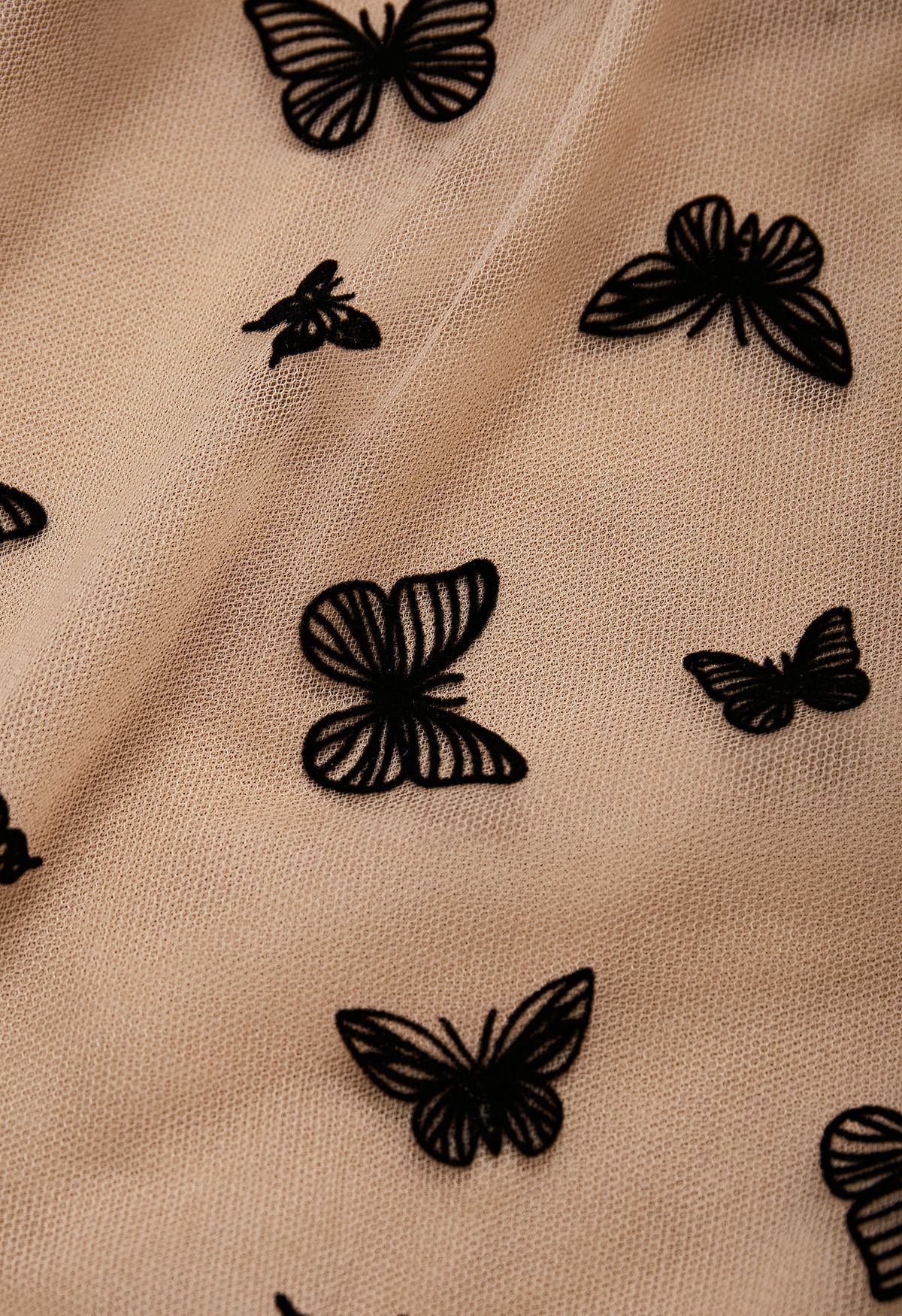 Falda midi de tul con malla de mariposa de terciopelo en caramelo
