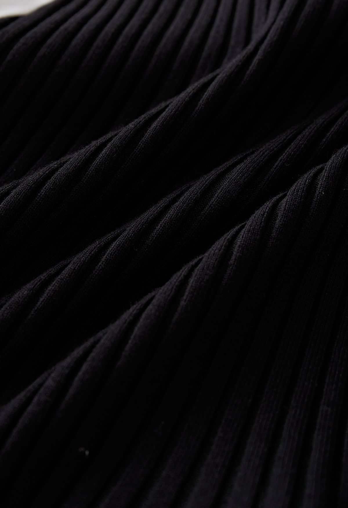 Camisa asimétrica de punto acanalado empalmado en negro