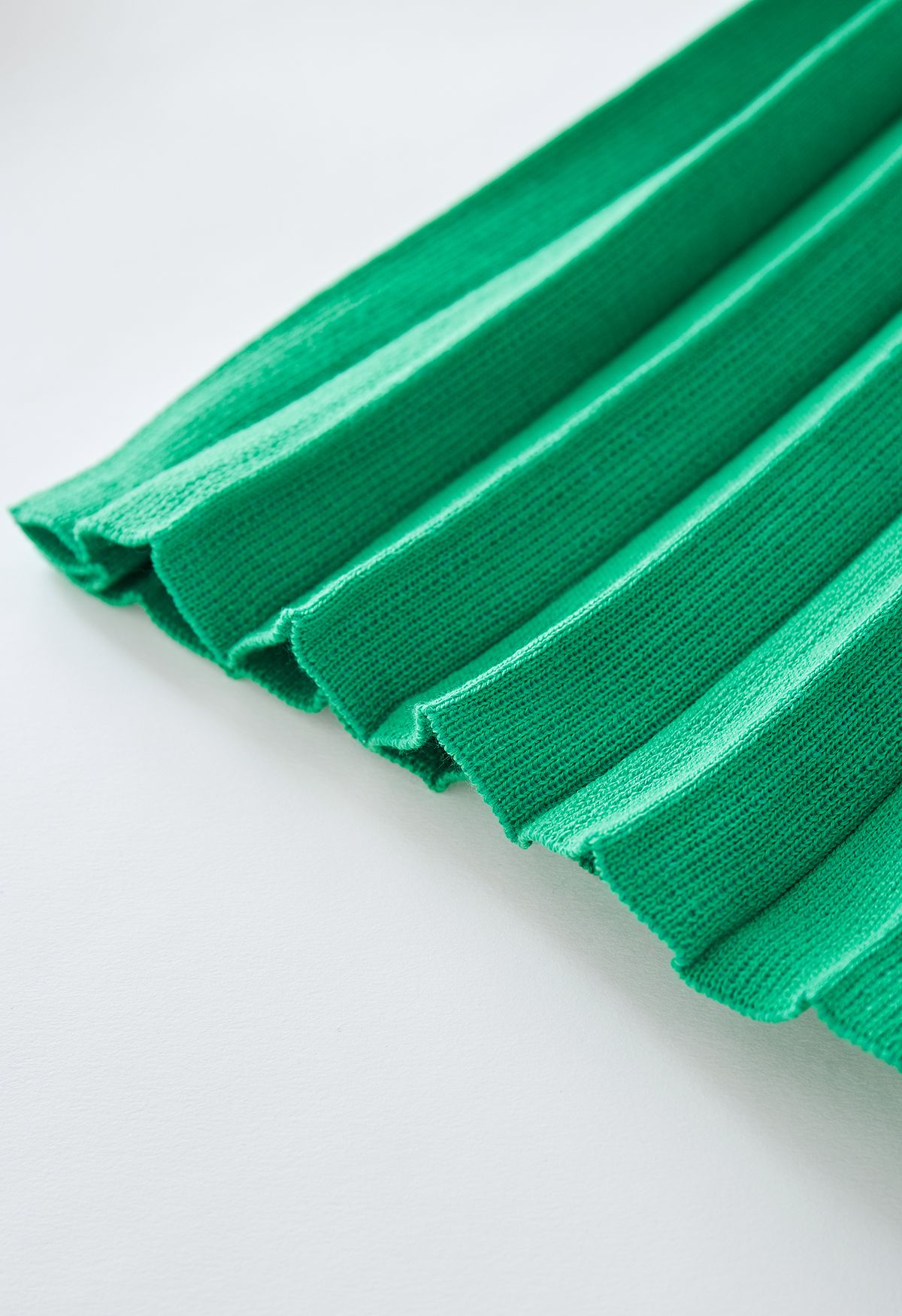 Conjunto de top de punto con cuello en V y falda plisada en verde