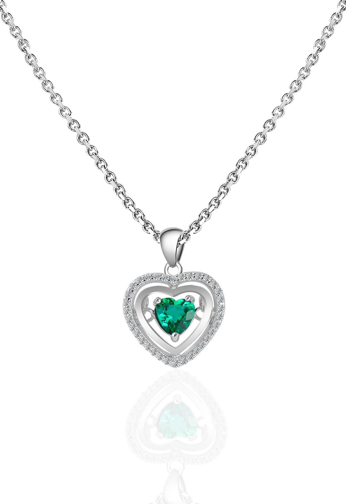 Collar de gemas de esmeralda con forma de corazón hueco