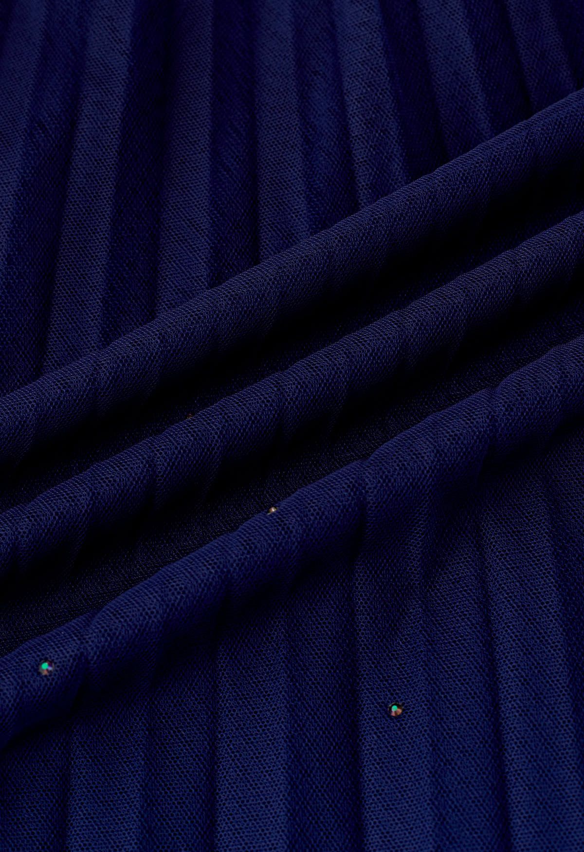 Falda de tul de malla plisada adornada con purpurina en azul marino