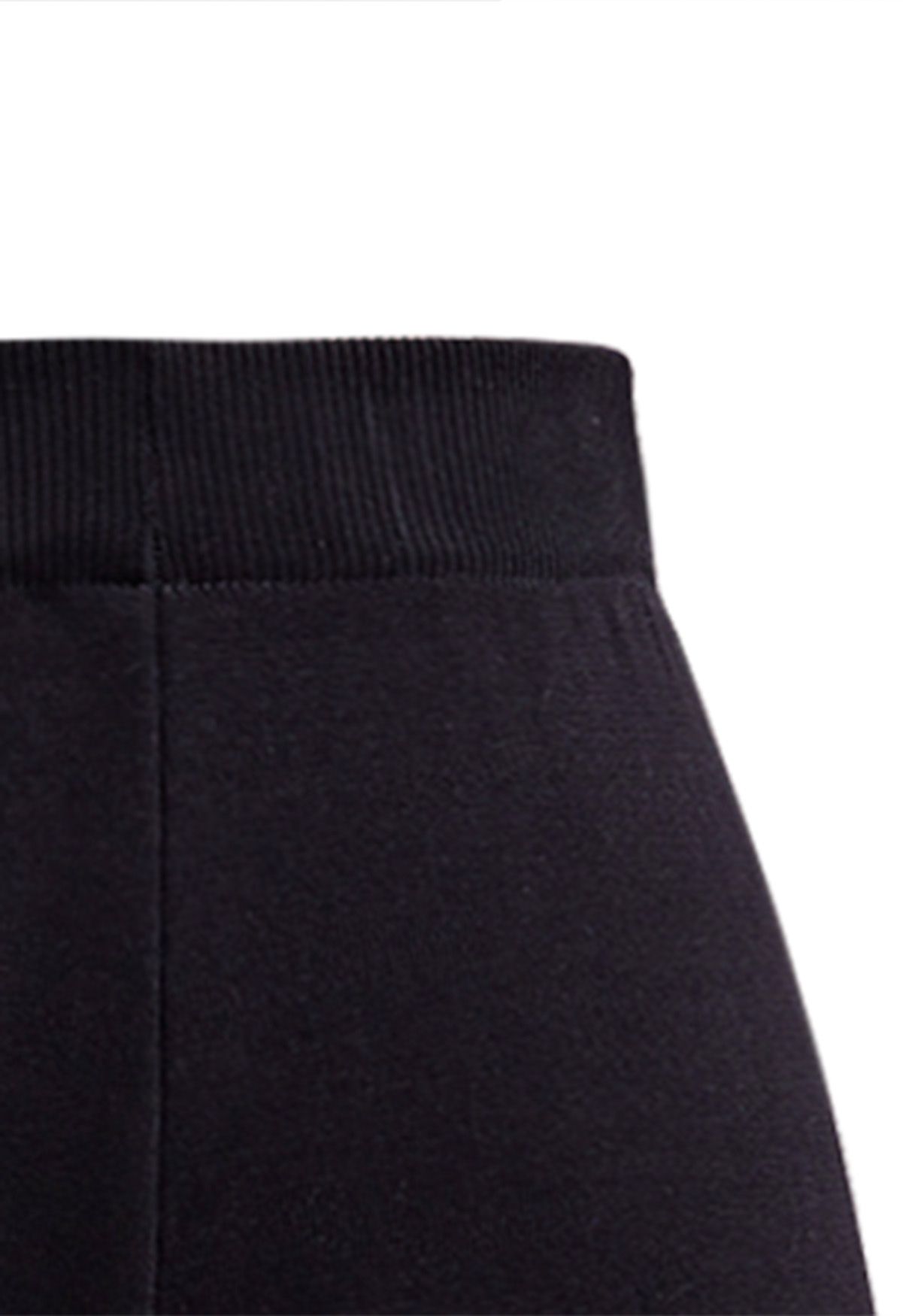 Conjunto de pantalón y suéter de punto con cuello alto a rayas en negro
