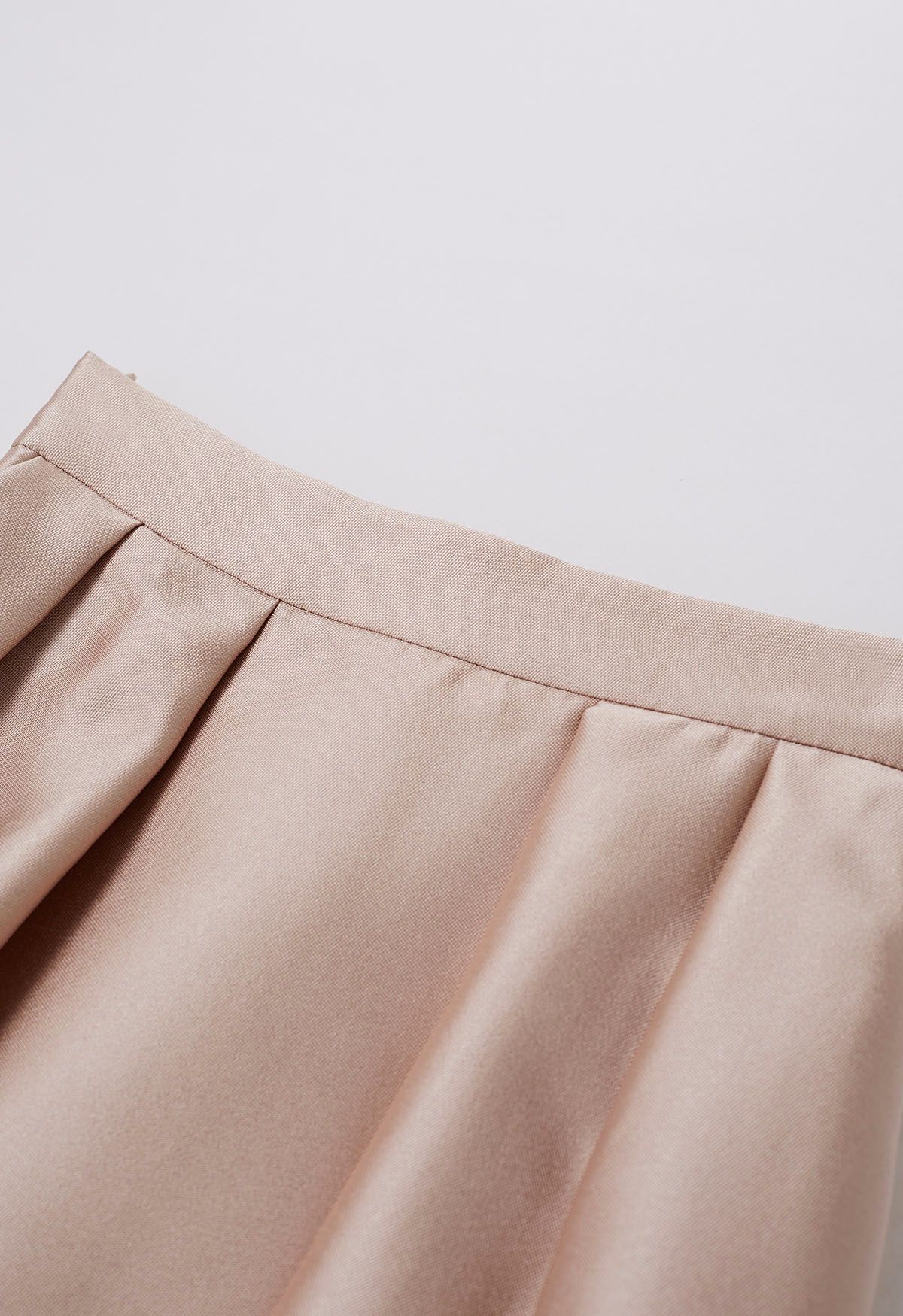 Elegante falda midi plisada de corte A con bolsillos laterales en coral
