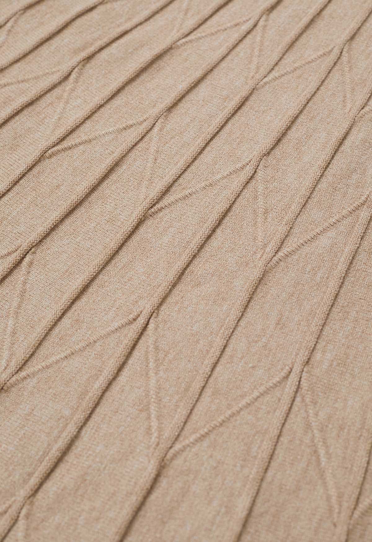 Falda de punto plisada en zigzag en color arena