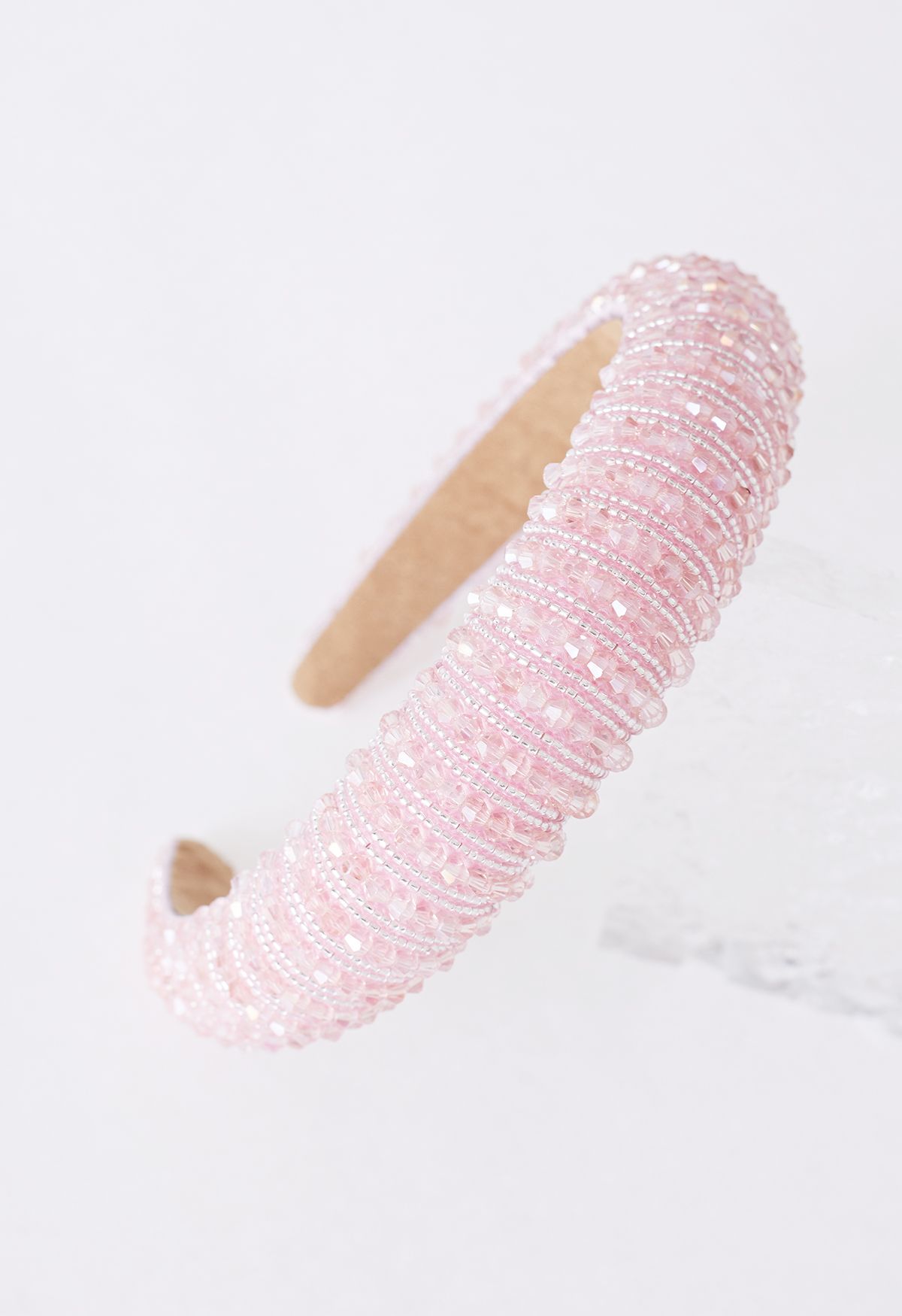 Diadema con cristales de strass en rosa