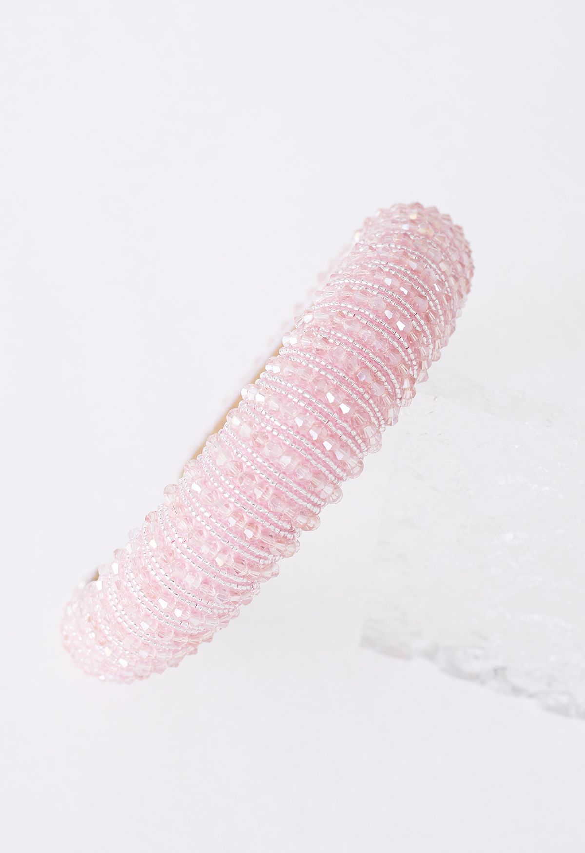 Diadema con cristales de strass en rosa
