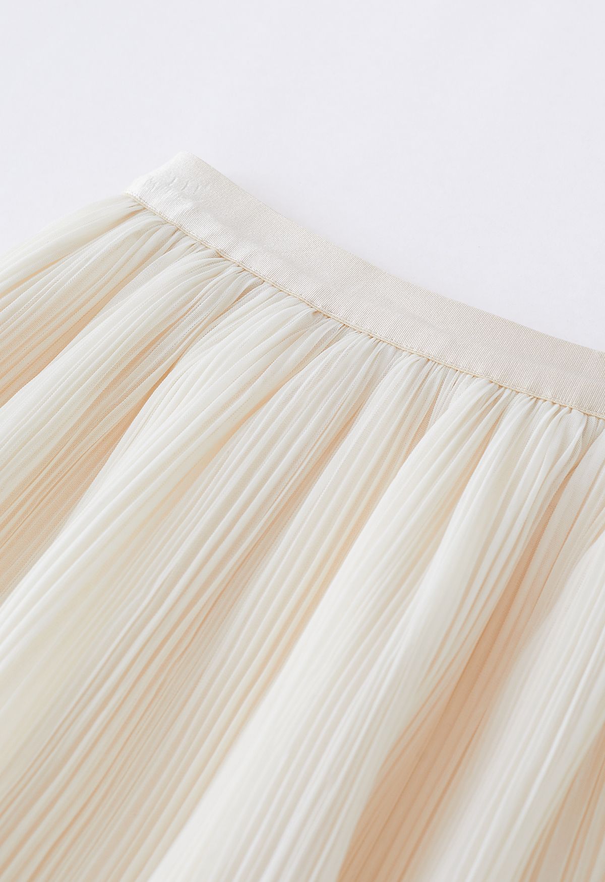 Falda plisada de tul de malla de doble capa en color crema