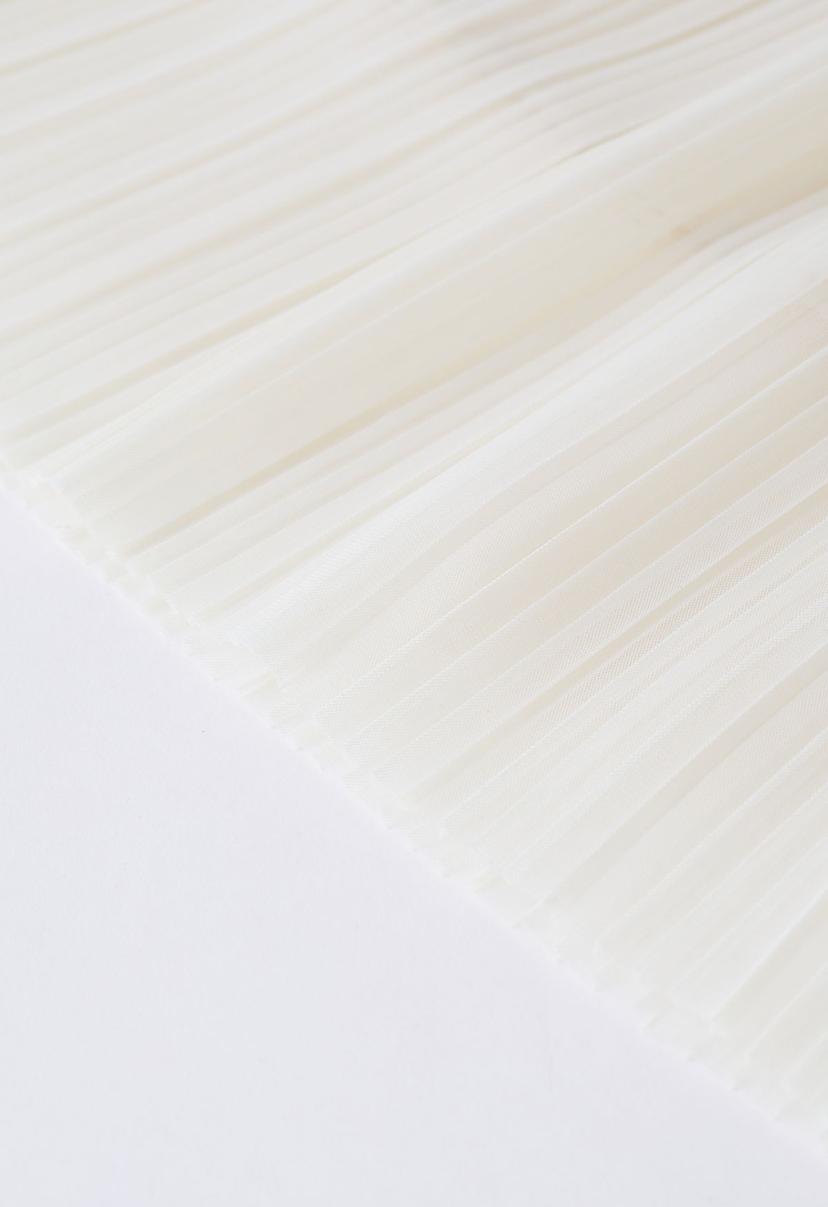 Falda plisada de tul de malla de doble capa en color crema