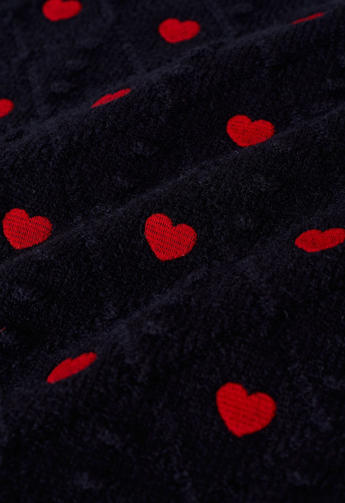 Suéter corto de punto con bordado en relieve Full of Hearts en negro