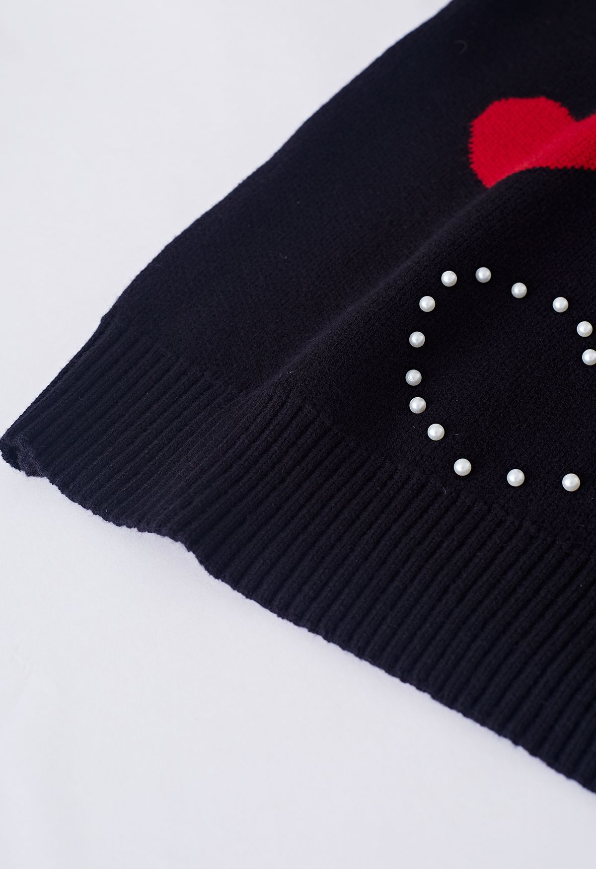 Suéter de punto con ribete de perlas Passionate Heart en negro
