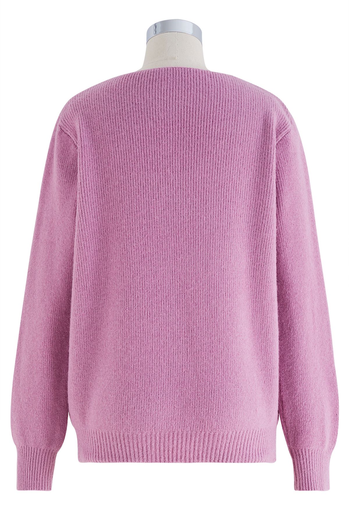 Suéter de punto con escote de perlas recortadas en rosa