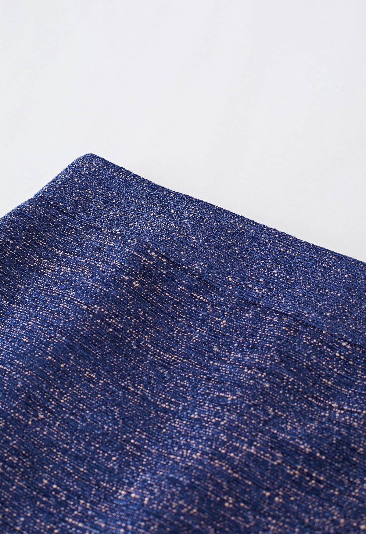 Minifalda azul marino con dobladillo con flecos