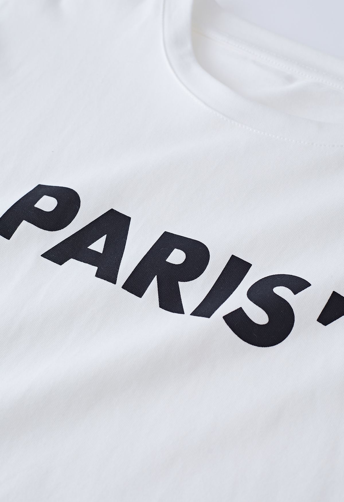 Camiseta de cuello redondo con estampado de París en blanco