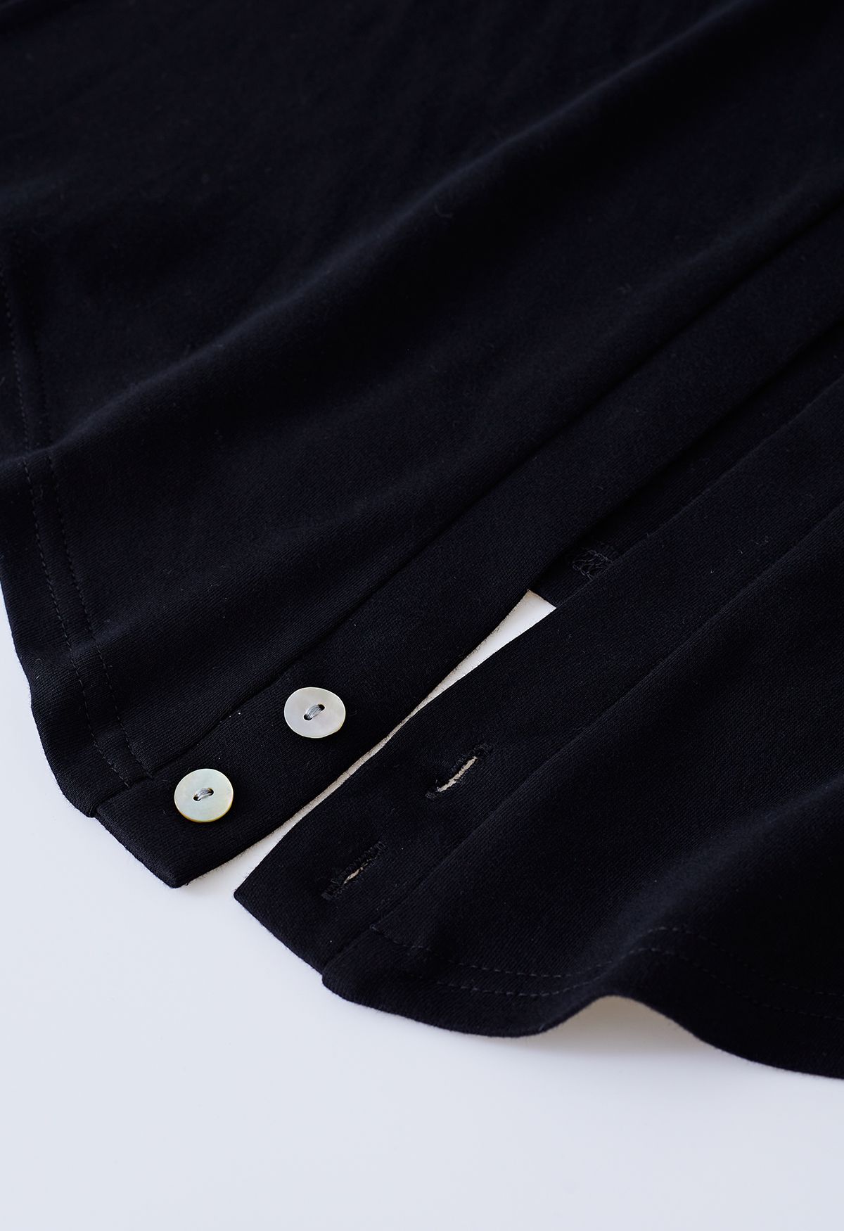 Top de algodón sin mangas con cintura entrecruzada en negro