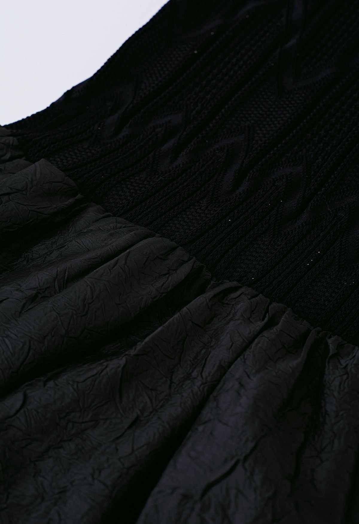 Vestido sin mangas con textura de empalme de punto en negro