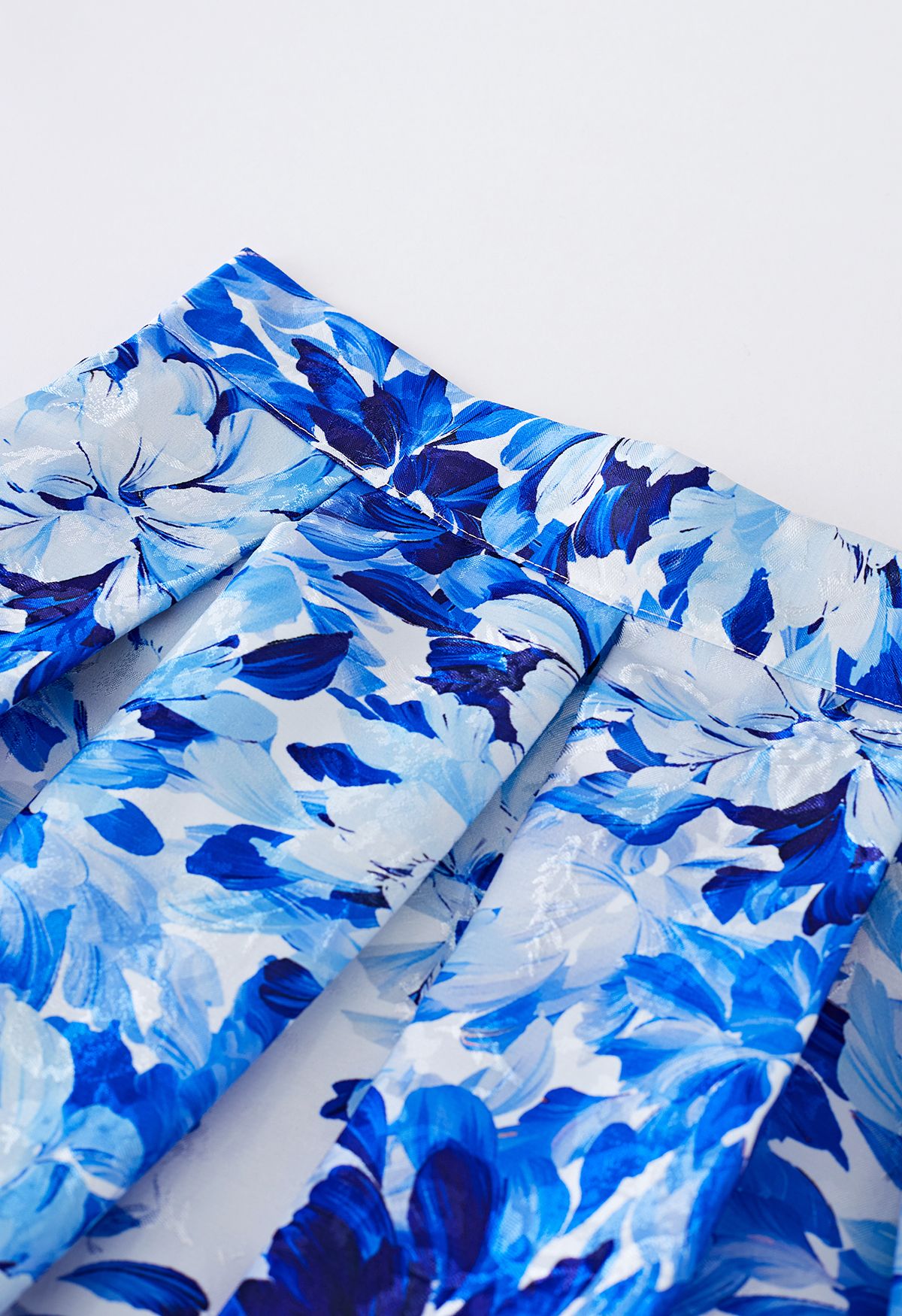 Falda midi plisada de jacquard con estampado floral azul real