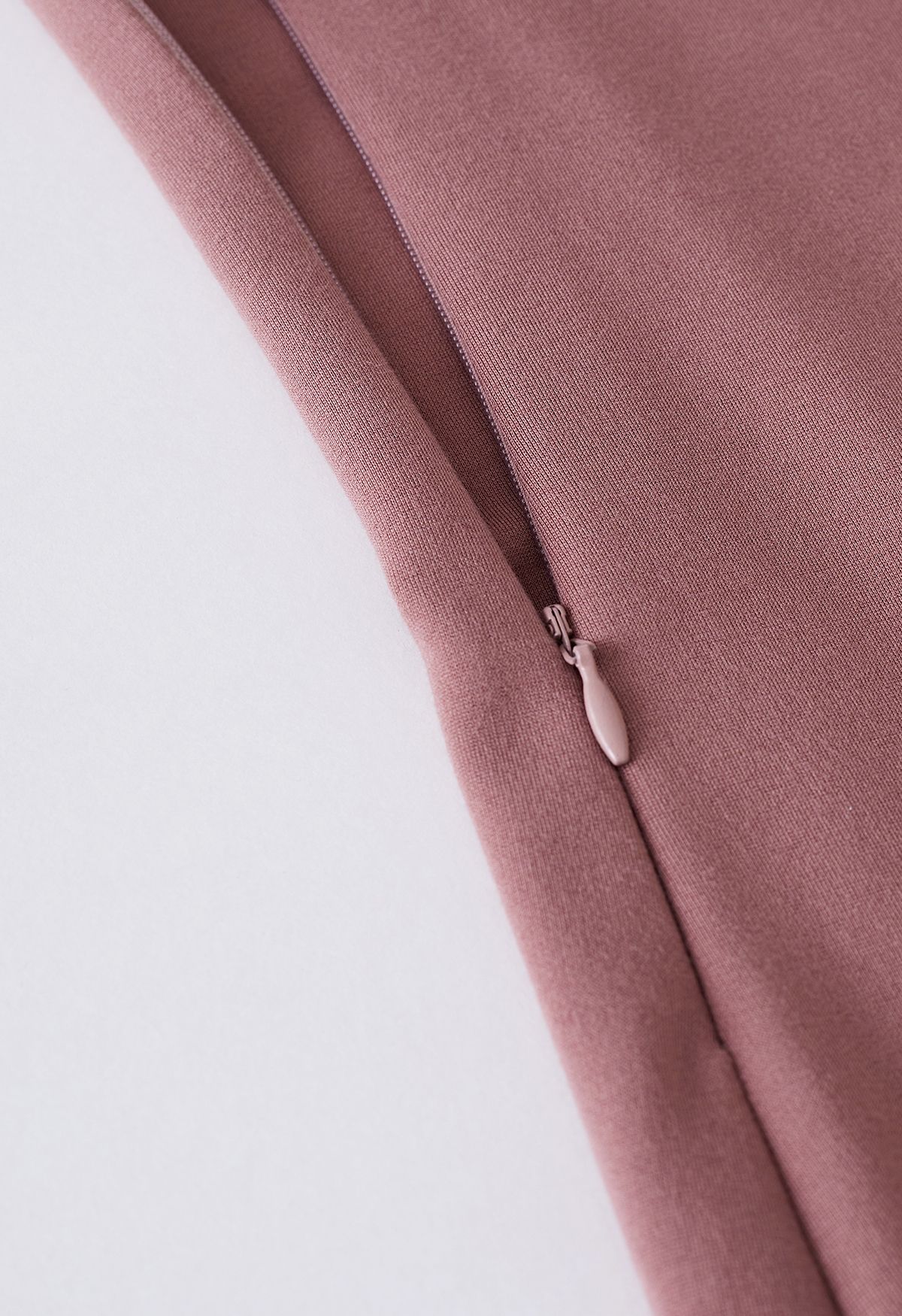 Minivestido sin mangas con pliegues laterales en rosa polvoriento