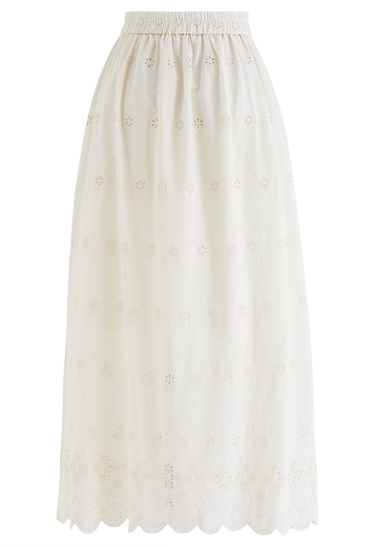 Falda larga con abertura lateral y ojales bordados en color crema