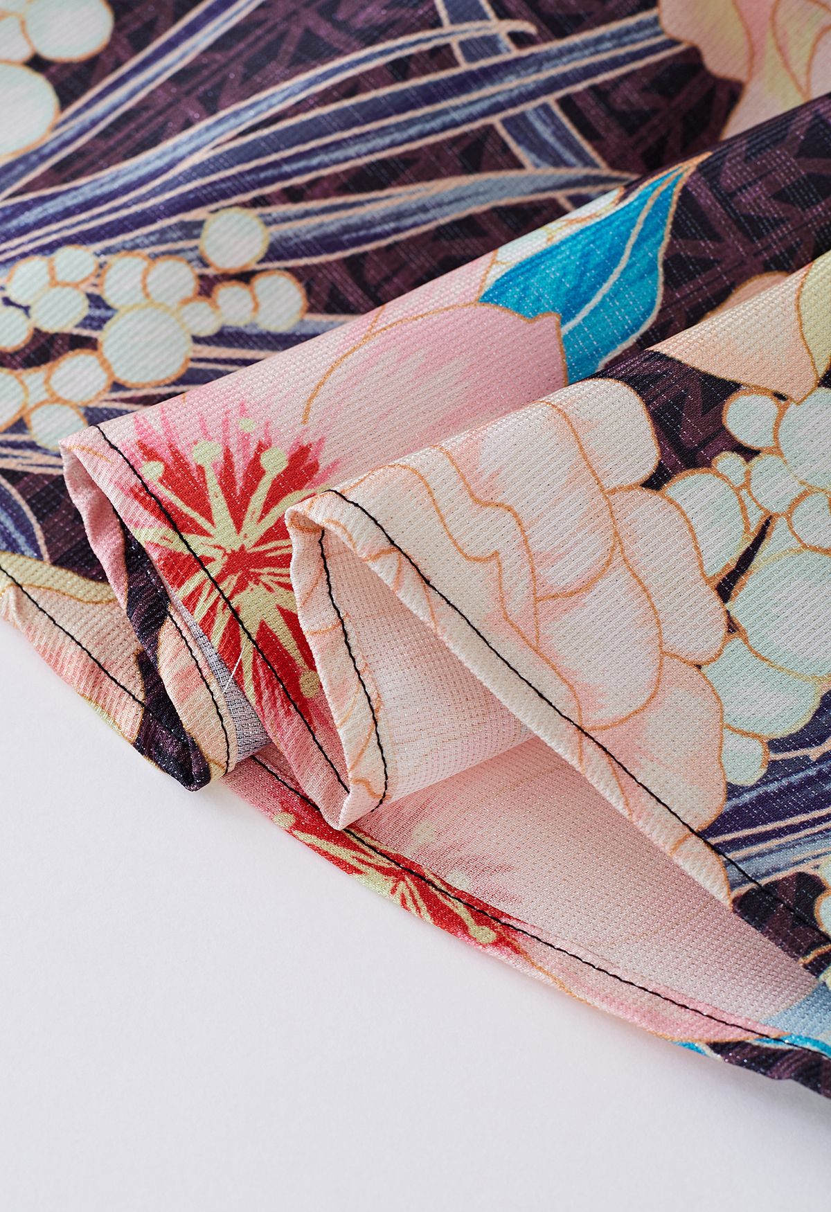 Falda midi con estampado floral metalizado brillante