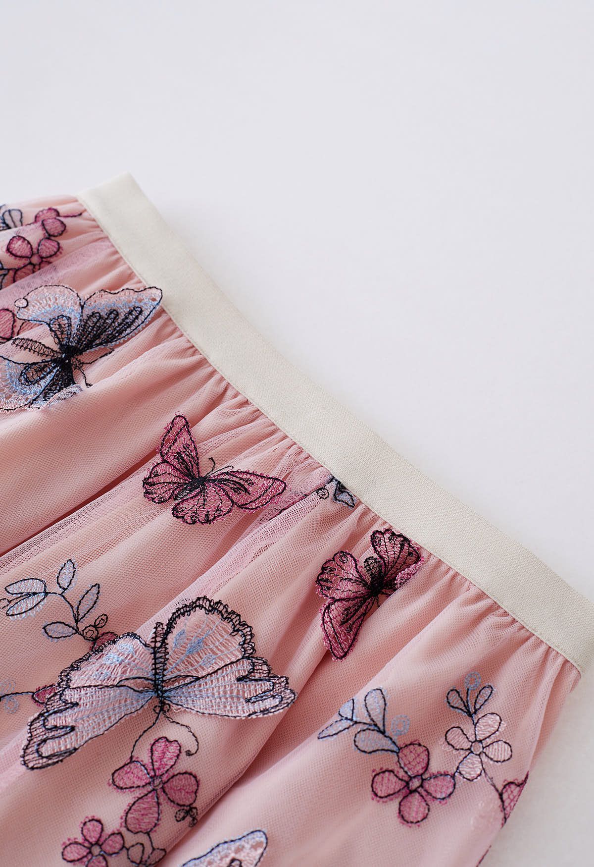 Falda midi de malla con mariposas en 3D de colores