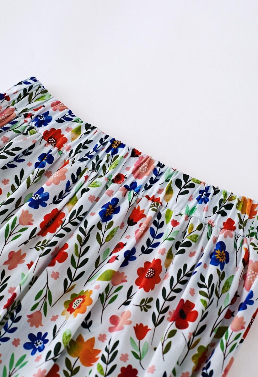 Conjunto de falda acampanada y top corto con lazo y hombros descubiertos con estampado de flores