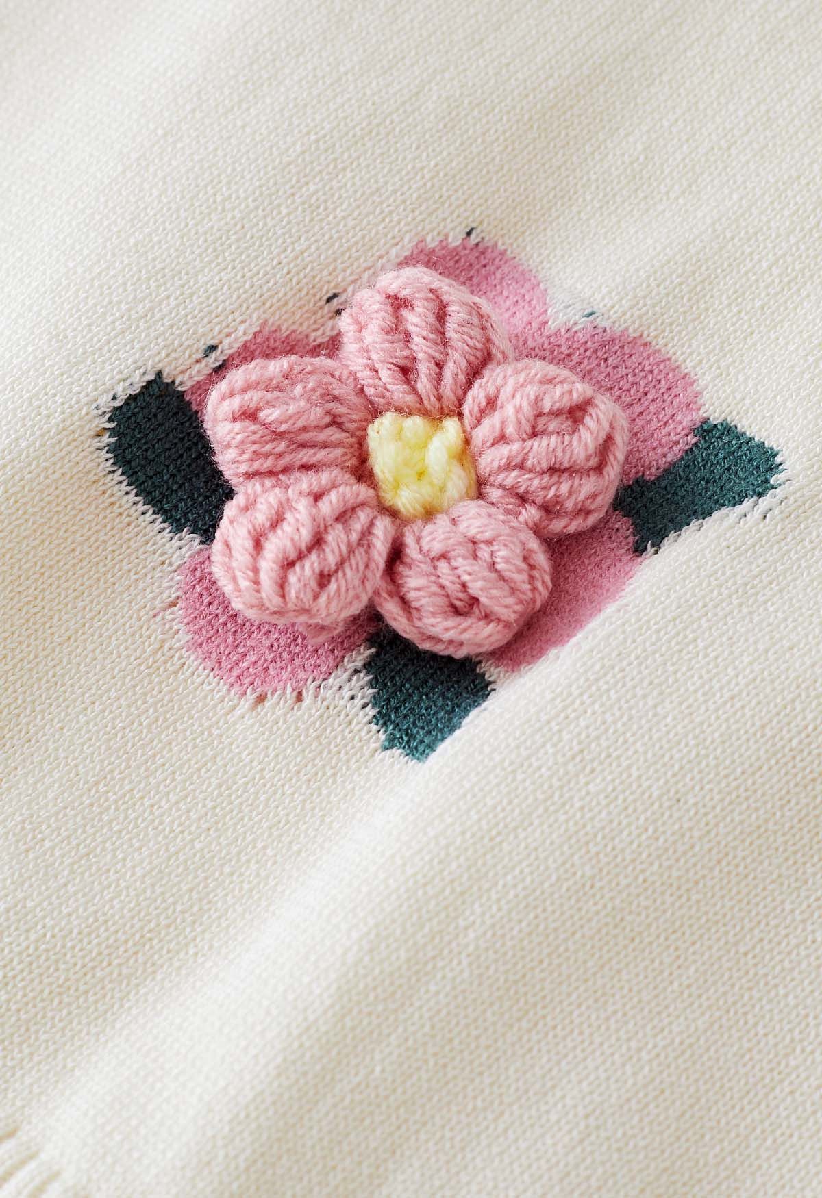 Top de punto de manga corta con flores de puntada rosa en crema