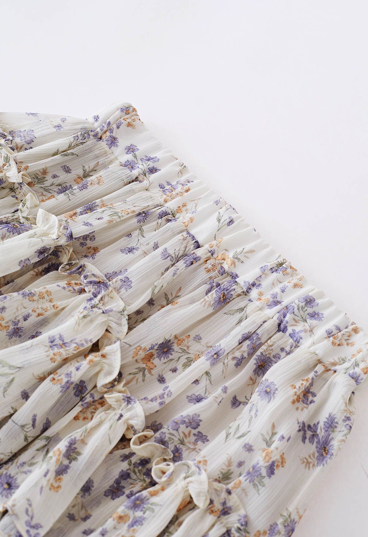 Conjunto de top de gasa con volantes y minifalda pantalón a capas en crema floral