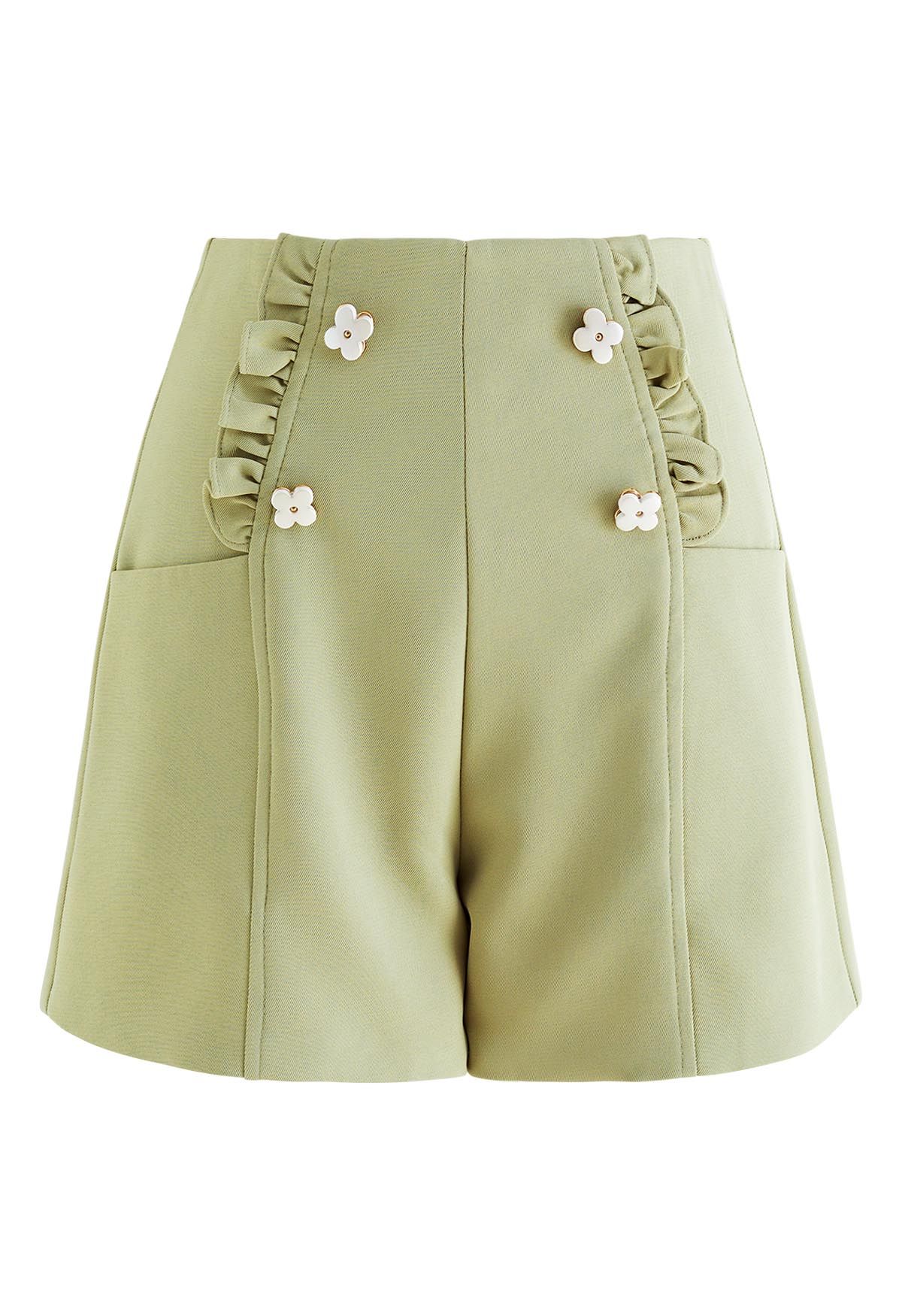 Adorables pantalones cortos con ribete de volantes de flores en verde guisante