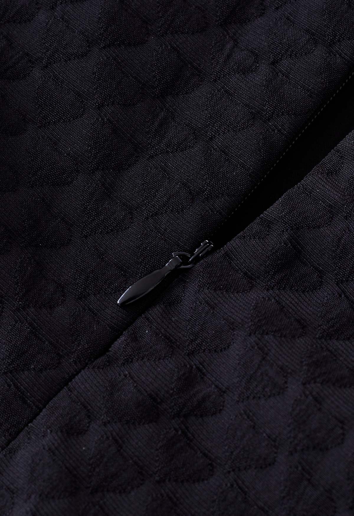 Falda midi plisada con textura de corazón en relieve en negro